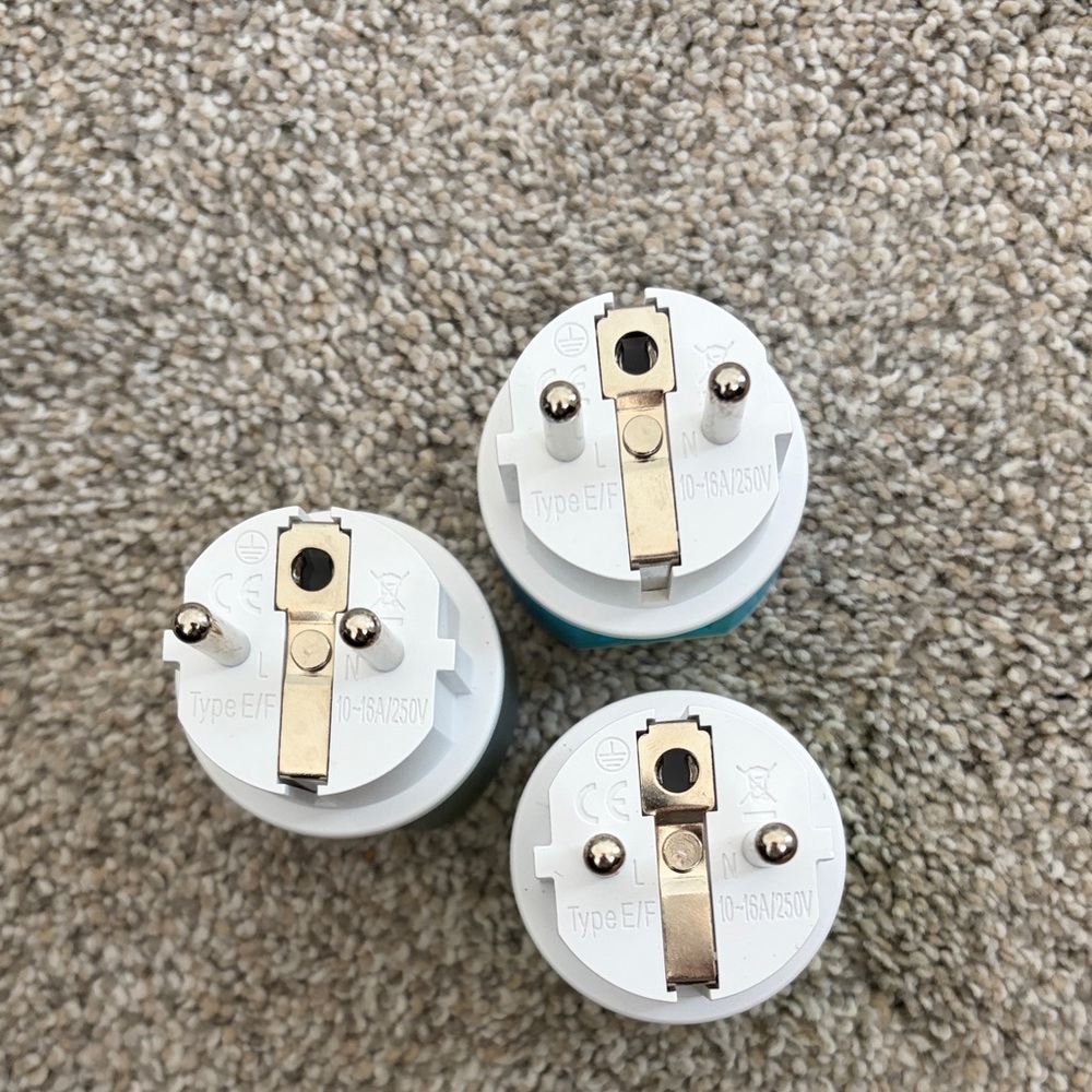 White and Blue Electrical Plug Adapters